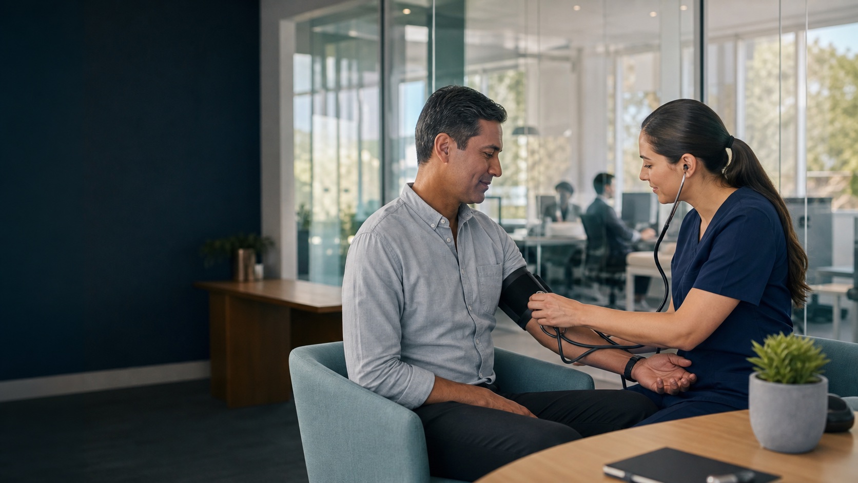A clinician checking an employee's blood pressure in a modern office